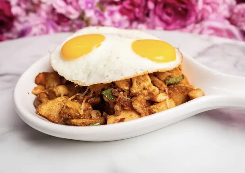 Toast It IZ potato skillet topped with eggs