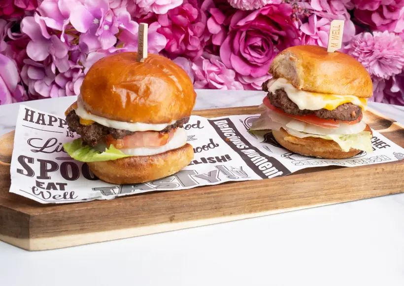 Toast It IZ sliders against the pink floral wall